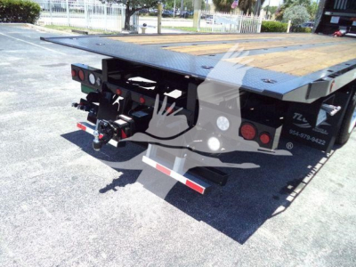 Kenworth T880 rollback trailer showing rear view with hitch and taillights