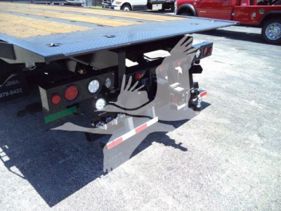 Kenworth T880 rollback trailer rear with lights and staging platform visible.