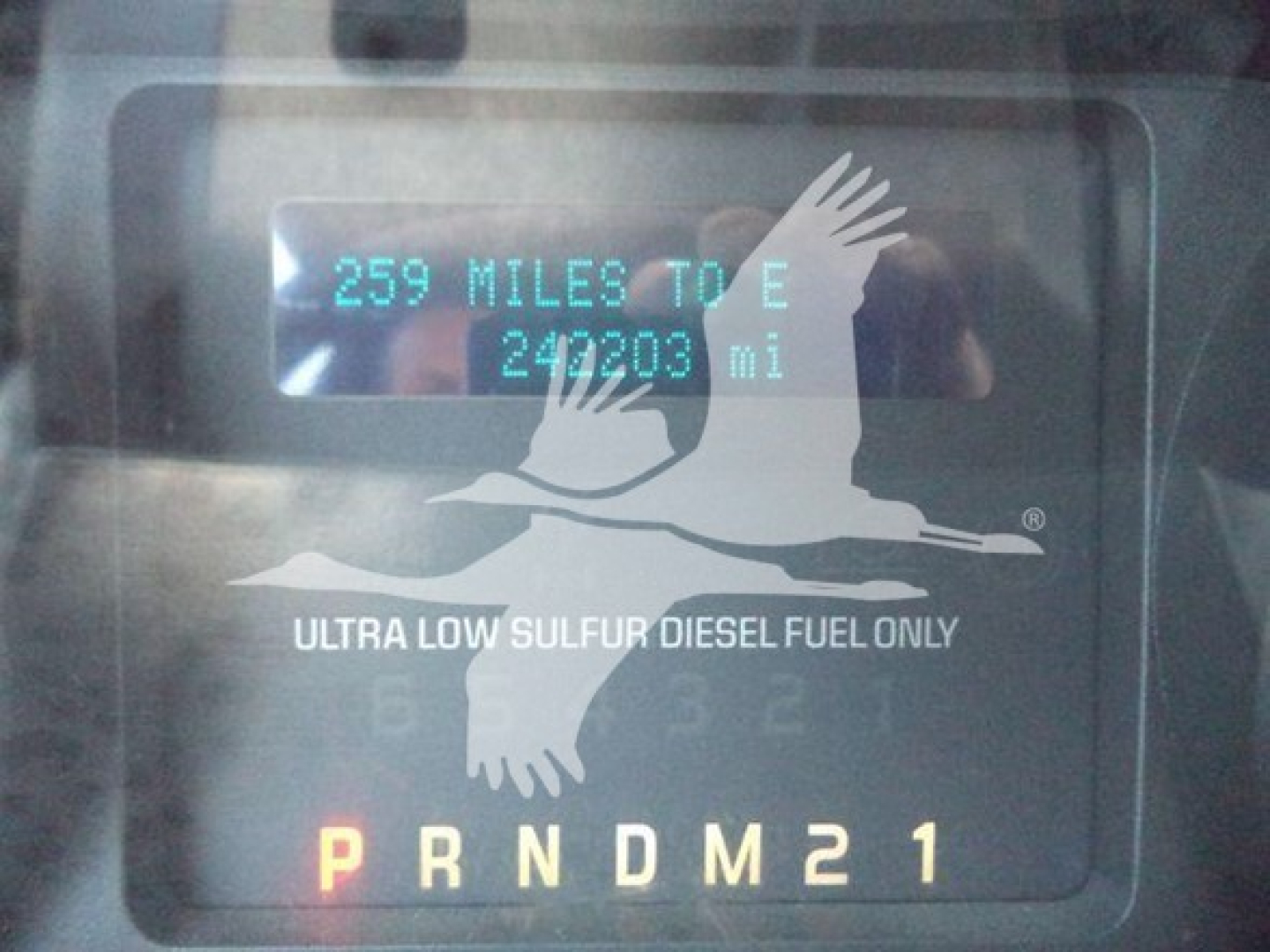 Ford F650 rollback dashboard display showing 259 MILES TO E and 249203 mi with Ultra Low Sulfur Diesel Fuel Only and PRNDM21 gear indicator.