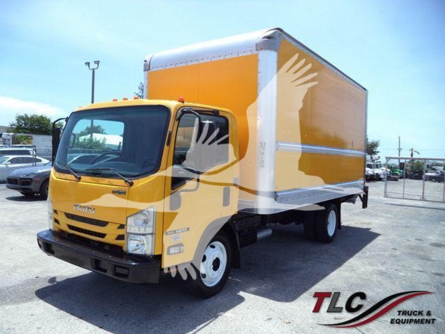 Isuzu NPR HD box truck showing bright yellow cab and large orange box cargo area.