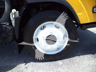 Isuzu NPR HD 2019 truck front wheel and fender showing front tire and wheel arch