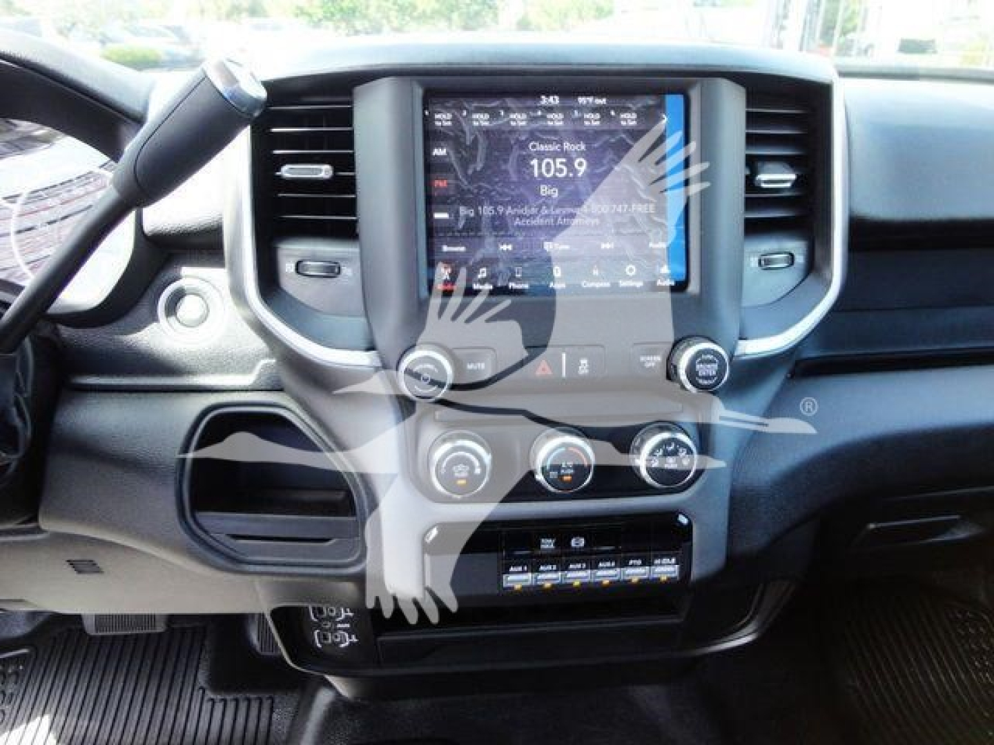 Ram 4500 interior center console with touchscreen display and climate controls visible.