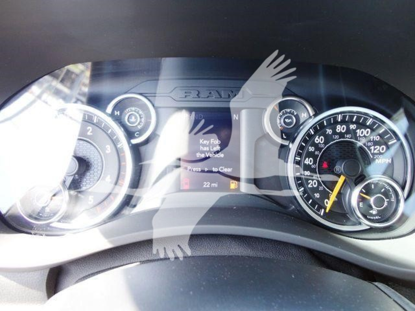 Ram dashboard cluster and steering wheel view in a 2024 Ram 4500 SLT with instrument gauges visible behind the steering wheel.