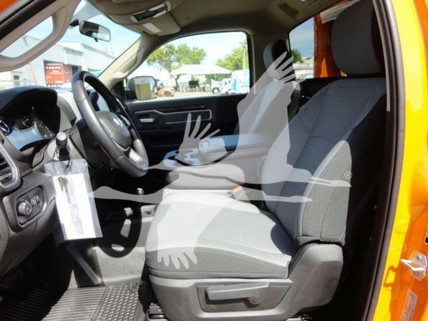 Ram 4500 SLT interior front seats and steering wheel view showing seats and dash area.