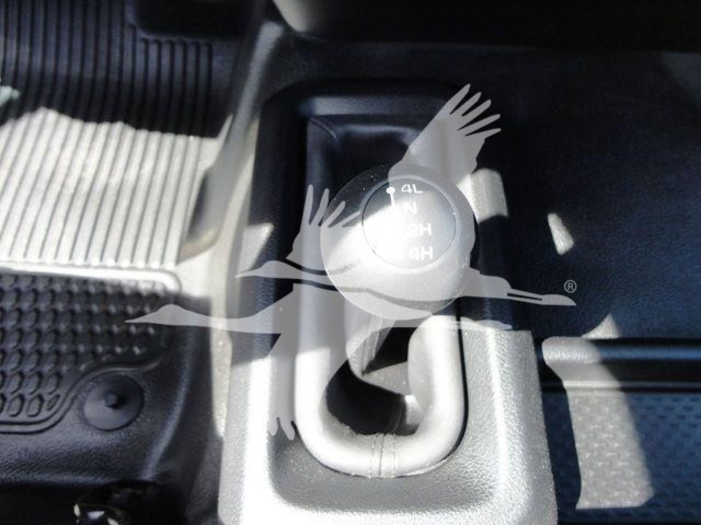 Trailer towing winch control knob and shifter visible in a Ram 4500 interior, showing 4L 2H 1H gears on the knob