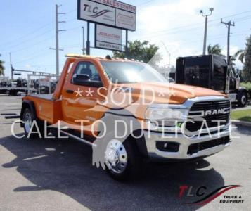 Ram 4500 single cab pickup truck in orange, front three-quarter view, with 'SOLD' watermark and 'CALL TO DUPLICATE' text overlay.