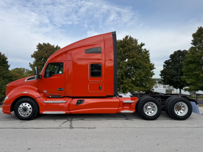 Kenworth T680 tractor side view showing sleeper cab silhouette and rear dual axles.