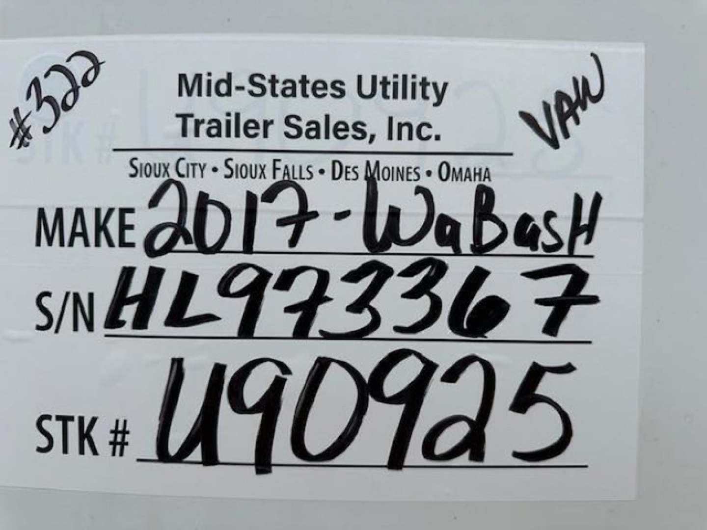 Trailer tag showing Make 2017-Wabash handwritten, S/N HL9733367, STK# U490925, VIN 1JJV532D5HL973367, Mid-States Utility Trailer Sales. 