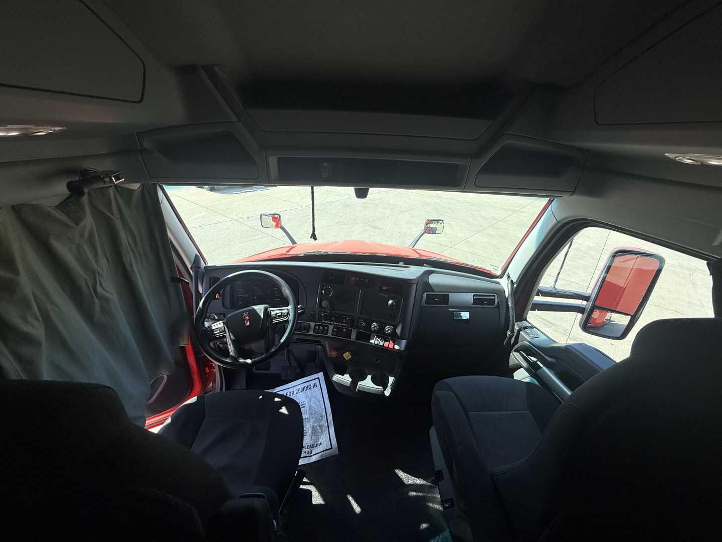Kenworth T680 truck interior dashboard and steering wheel view