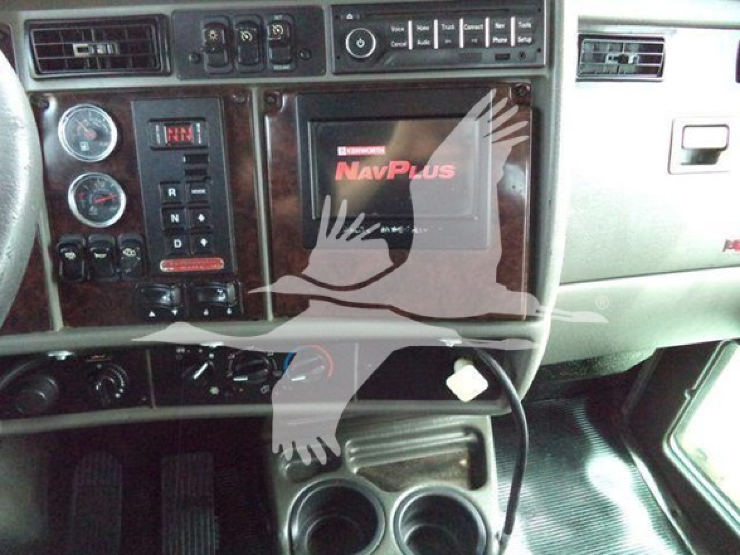 Dashboard view of 2014 Kenworth T270 cab showing NavPlus infotainment/weather system and instrument cluster.