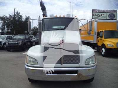 Kenworth T270 front view in a truck yard with stock number T13346 and VIN 2NKHHM6X6EM413346 visible.