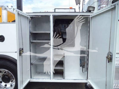 Service utility truck rear cargo area with open doors, white interior shelves and equipment visible; 2014 Kenworth T270 listing information overlay.