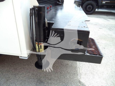 Kenworth T270 service truck rear step and hydraulic jack, platform with anti-slip surface, fuel/equipment rack visible.