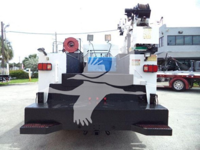 Kenworth T270 rear view showing platform and crane equipment with lights and towing arms.