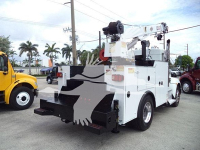 Kenworth T270 service truck rear view with crane, white body, stock towing equipment, visible tool compartments and rear bumper.