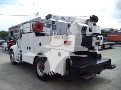 Kenworth T270 service/utility truck in view showing tool compartments and rear platforms.