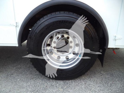 Kenworth truck wheel and tire profile showing steel wheel and Bridgestone tire in service utility body.