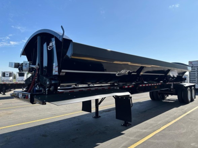Jet Tandem Air Ride Side Dump trailer showing 40' length with black exterior and Jet logo on side.