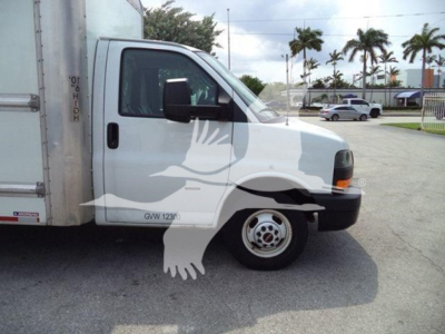 GMC G3500 box truck cab front-right view with a large ghost watermark image overlay; visible text on the door reads GVW 1230 (likely GVW 1230).