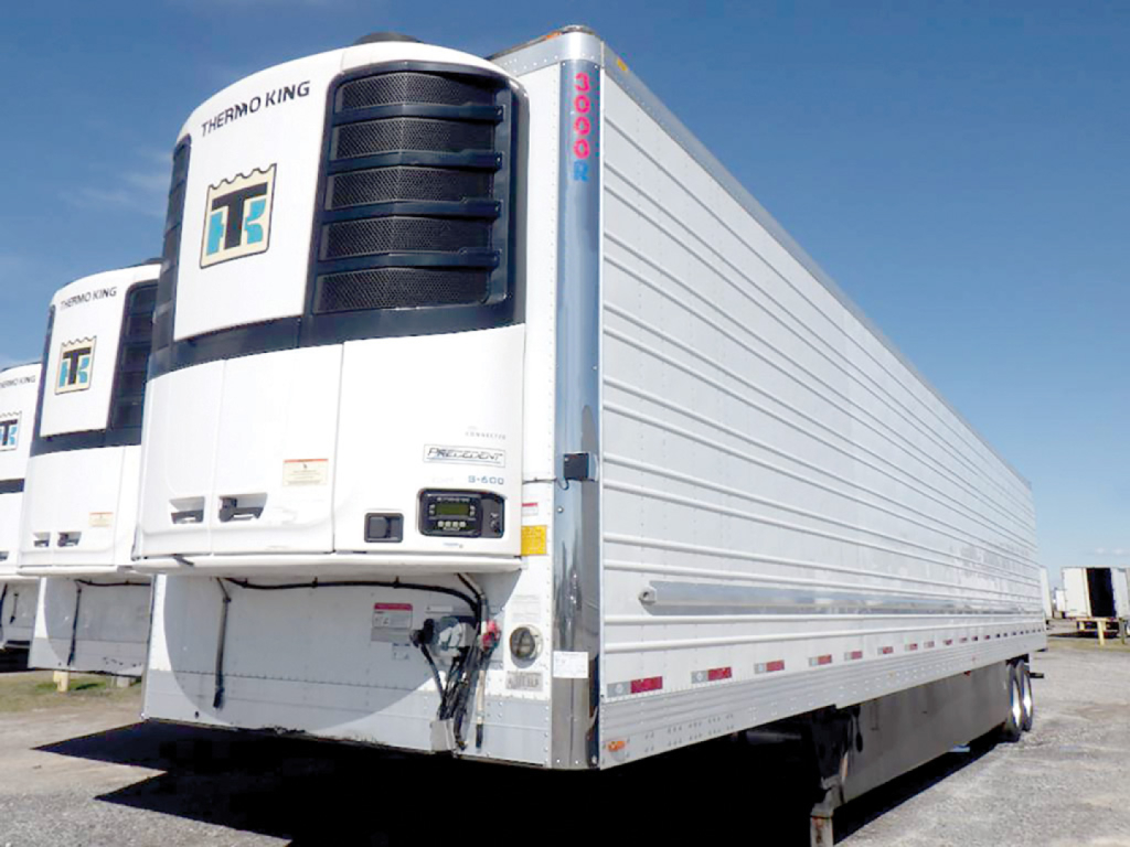 Utility 3000R refrigerated trailer in-service showing Thermo King unit and side panels with reefer trailer features.