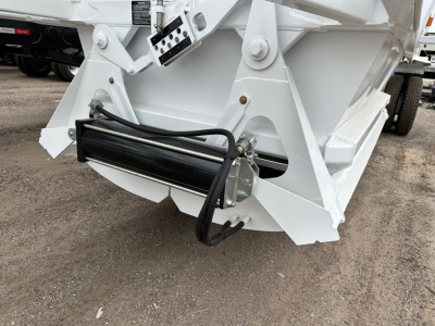 Ranco LW21-40 trailer component showing hydraulic hydraulic hose and black cylinder at rear with white painted metal frame