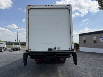 Truck rear view of a 2016 Ford F-750SD with box body, showing the back doors and chassis, no visible damage.