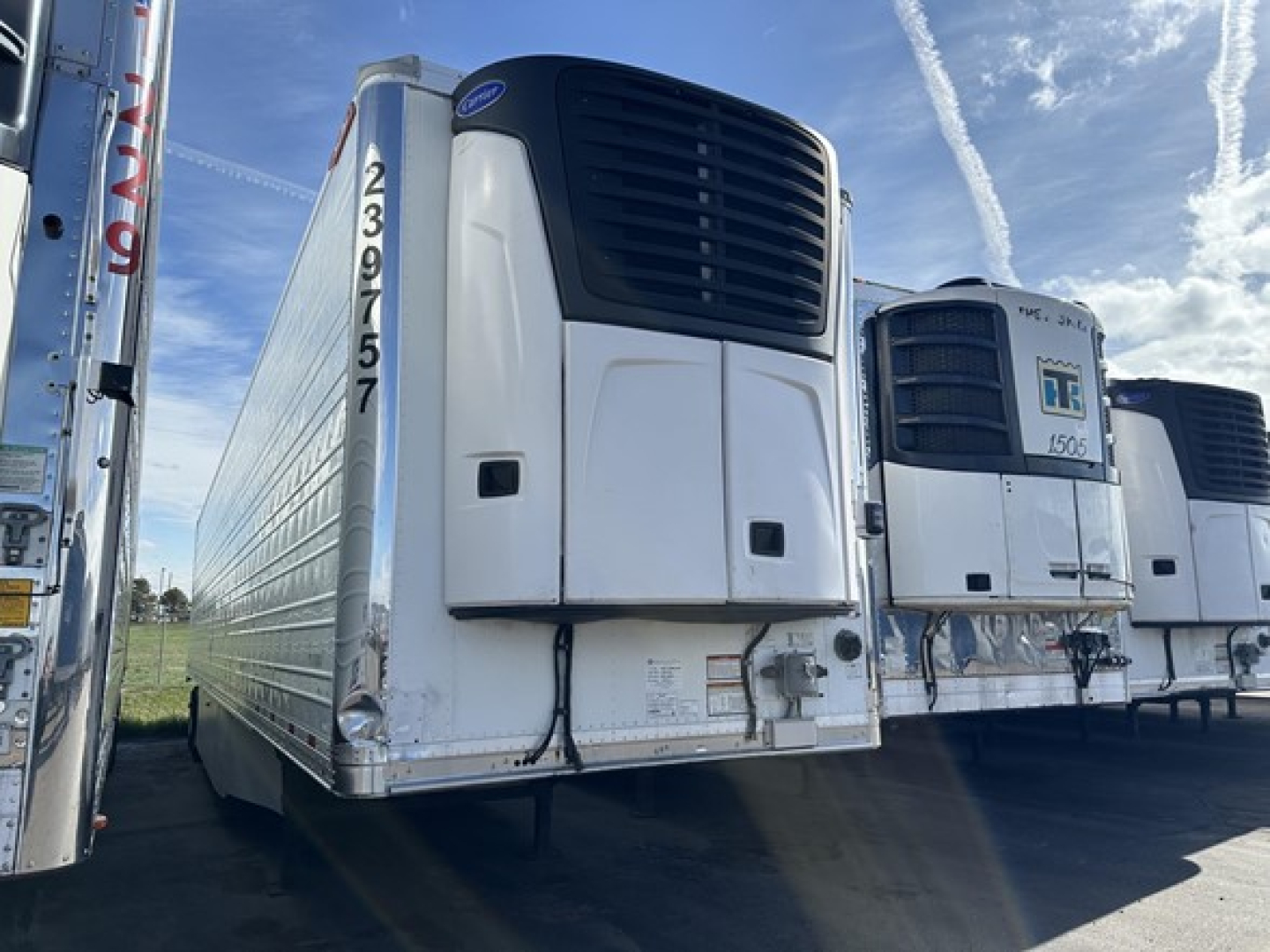 Great Dane 7300 refrigerated trailer in a row of trailers with front cooling unit and VIN visible on the nose.