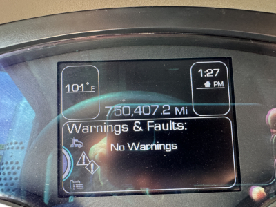 Dashboard display showing 101°F? time 1:27 PM, 750,407.2 Mi, No Warnings under Warnings & Faults on Kenworth T880 instrument cluster.