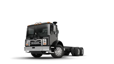 Mack TE64E truck cab and rear chassis visible with front grille and headlights.