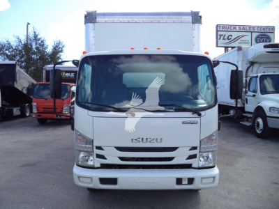 Isuzu NPR-HD box truck front view showing cab and cargo box in a dealership lot.