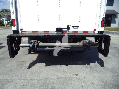 Isuzu NPR HD truck rear with chassis and hitch, showing mounting bars and underbody components; no legible text visible.