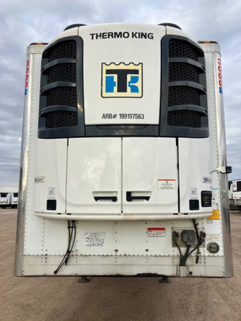 Thermo King refrigeration unit on the front of a refrigerated trailer showing ARB# 199179563 and various control panels.