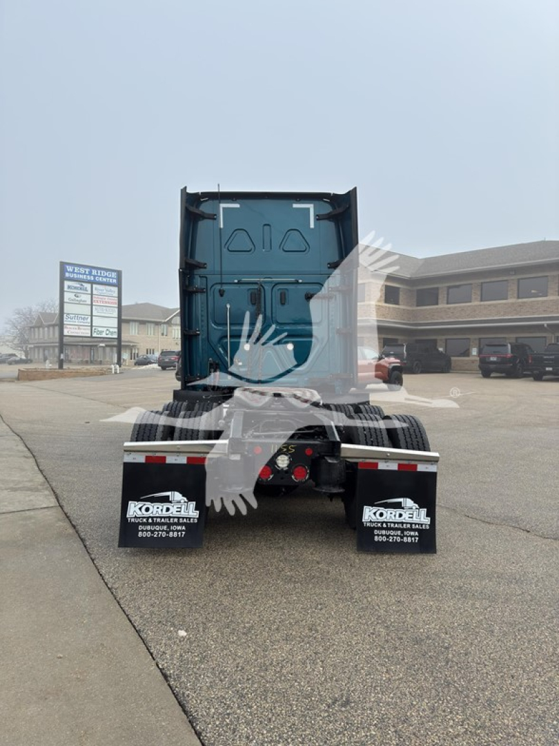 Rear view of a Freightliner Cascadia truck tractor with visible rear underrun protection and mud flaps showing 'KORDEAL' branding.