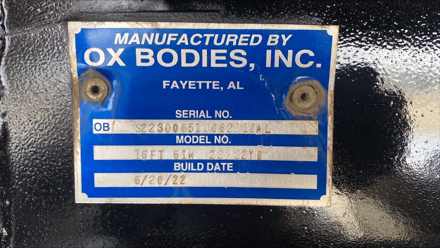 Plate reading Manufactured by Ox Bodies, Inc. Fayette, AL with serial number and model/build info on blue label.
