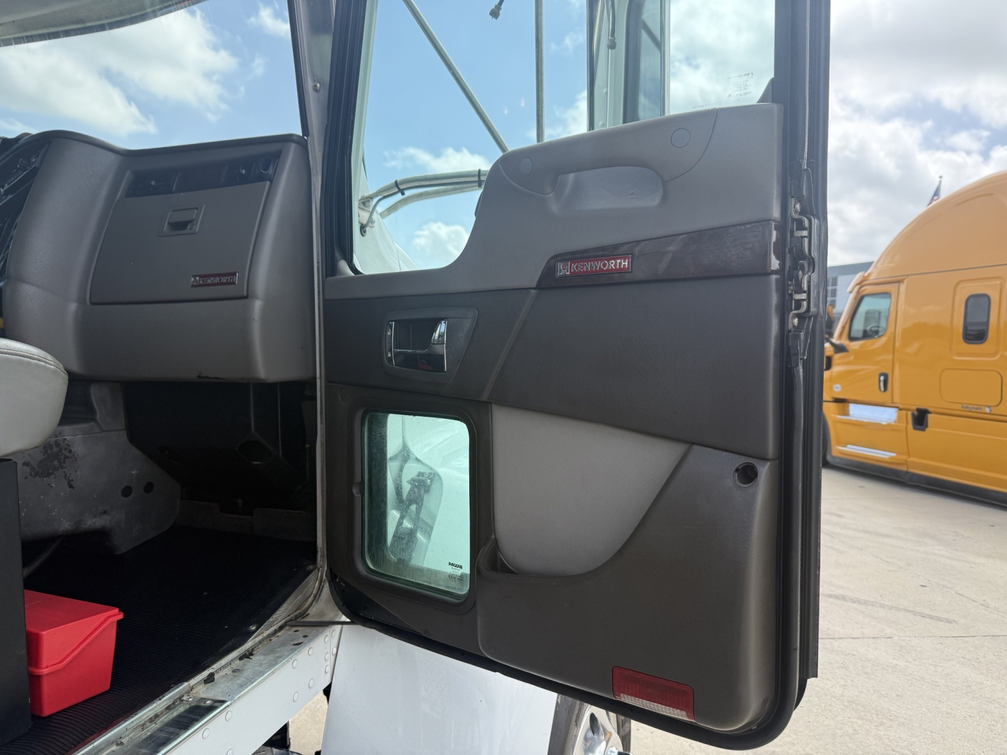 Kenworth T270 truck interior door panel with window and manual handle