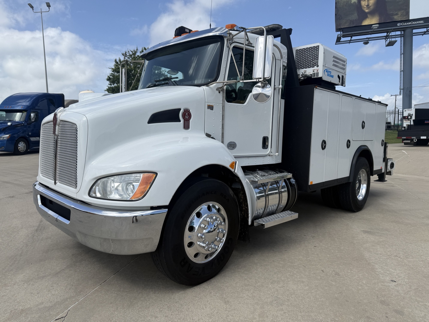 Kenworth T270 service/utility truck in white, front three-quarter view, with utility body compartments and crane, VIN 2NKHHM6X8LM420473, stock B3518P.