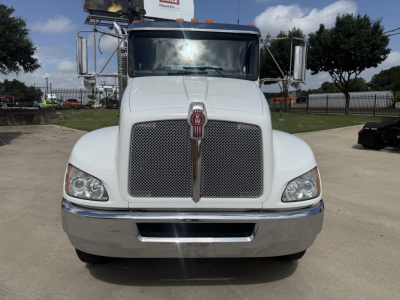 Front view of a white 2020 Kenworth T270 medium-duty truck showing large mesh grille, Kenworth emblem, rectangular headlights, chrome bumper, and side mirrors.
