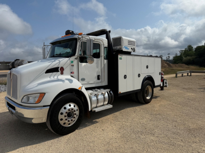 Kenworth T270 service truck in a parking lot showing large front grille and utility compartments.