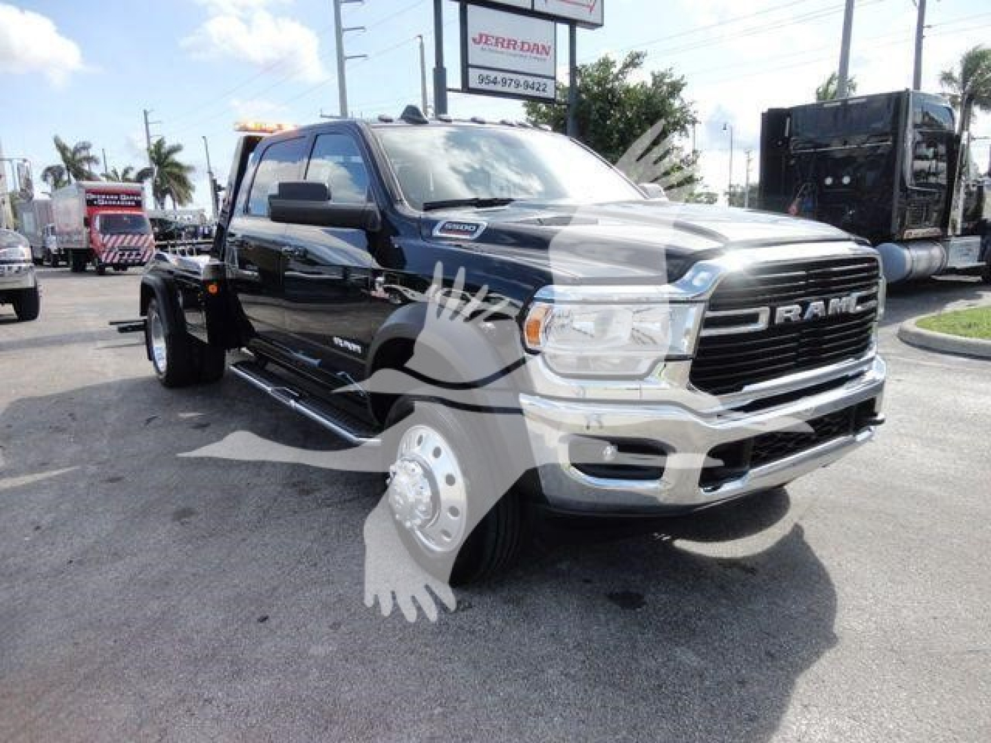 Ram 5500 truck front-left view showing chrome grille and RAM lettering, with Winch category vehicle.