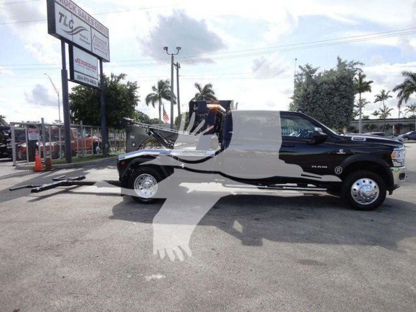 Ram 5500 SLT truck with winch setup on a dealership lot, visible front and side profile, stock number J68791.