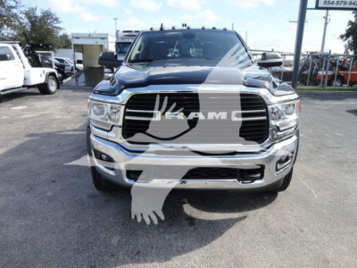 Ram 5500 front view showing chrome grille with RAM lettering and prominent bumper; visibility of headlights and windshield; watermark overlay from listing.