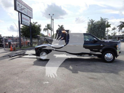 Ram 5500 SLT truck with winch setup on a dealership lot, visible front and side profile, stock number J68791.