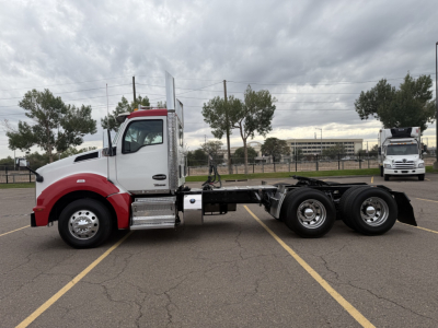 Kenworth T880 daycab chassis showing side profile and wheel configuration.