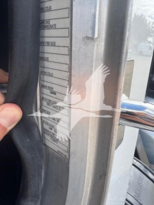 Peterbilt 337 side label showing tire/wheel specs and fluid capacity details on the door jamb area.