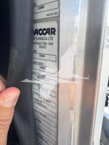 Peterbilt 337 component label with tire and weight specs visible; text includes 'GACCAR' sticker, weights and tire information panels.