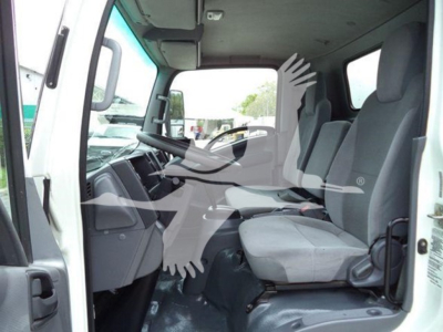 Isuzu NPR HD cab interior showing driver seat and passenger seat with dashboard view.