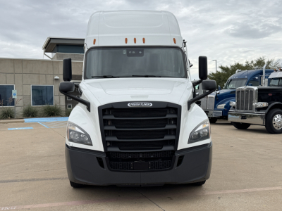 Freightliner PT126064ST truck front view showing grille, headlights, mirrors, and bumper.