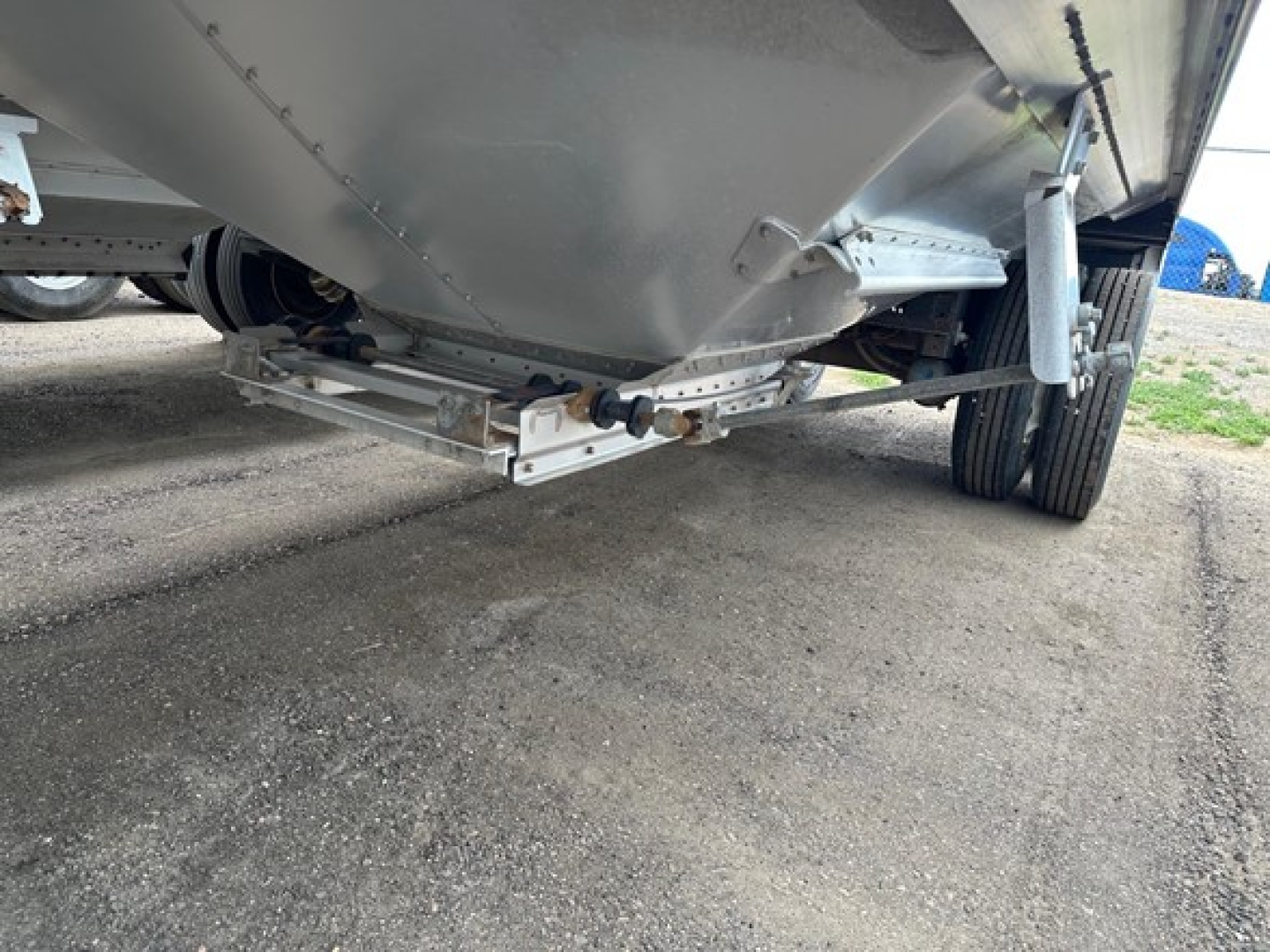 Trailer underside showing underside hitch and frame of a 2024 Timpte Super Hopper
