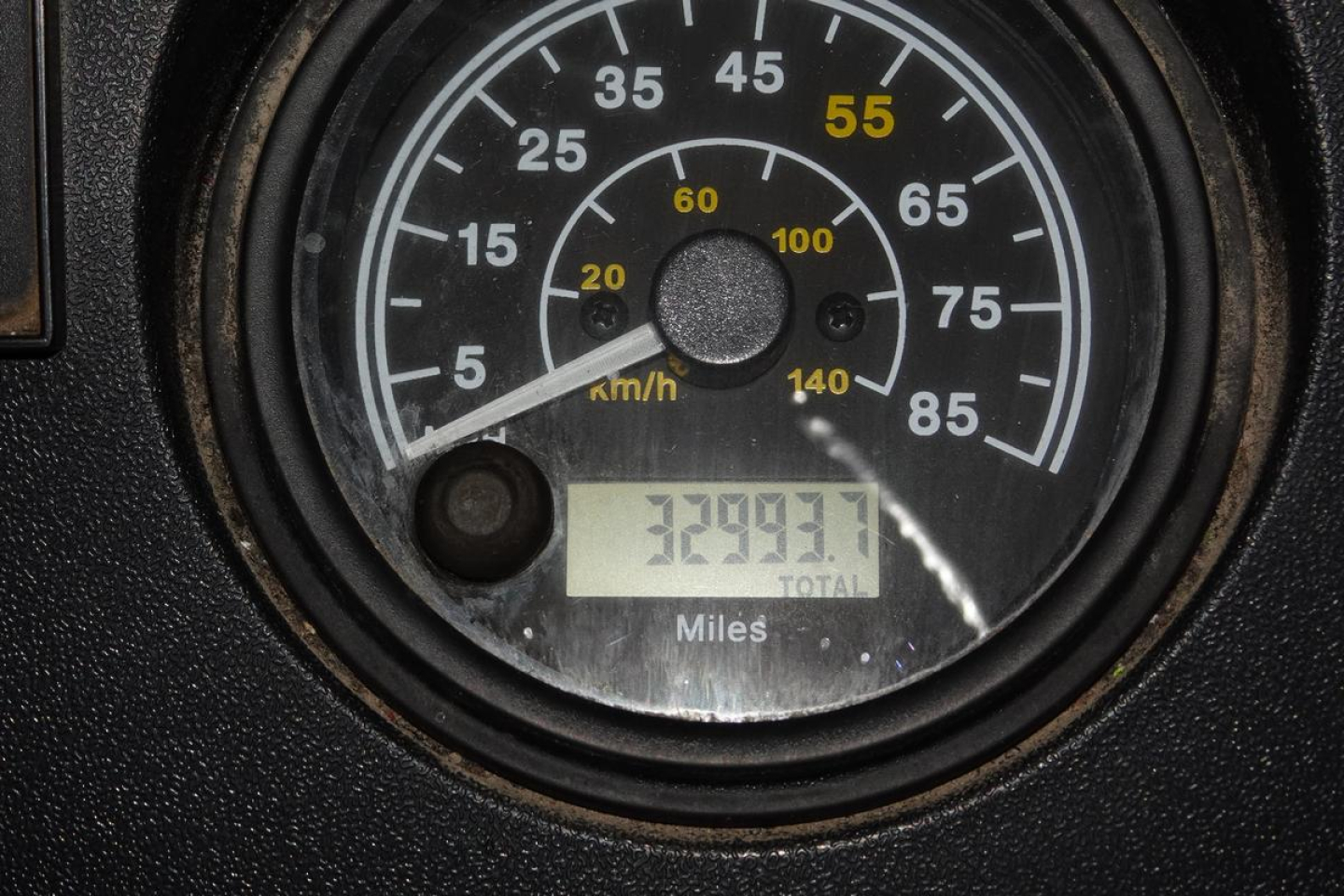 Mack RD RD688S truck dashboard speedometer showing 60 mph increments and total miles 323,? not clear
