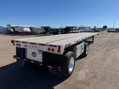 Flatbed trailer showing Utility Body forward with dual rear tires and license plate area.